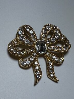 Vintage Monet Crystal Bow Brooch - Gold Tone Rhinestone Accent